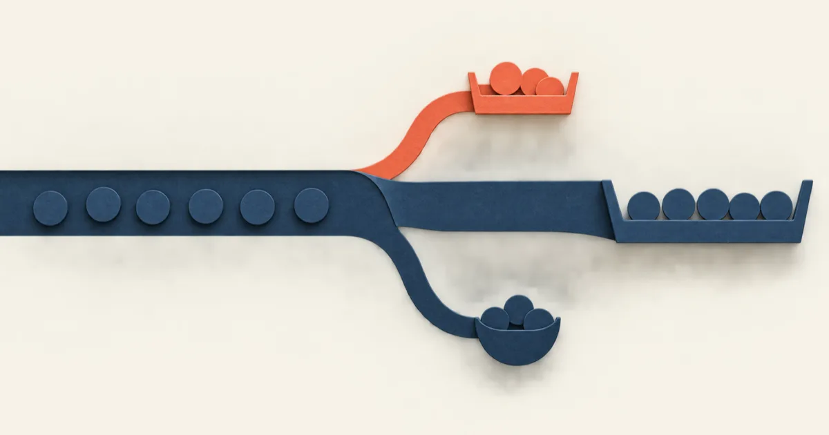 A navy channel divides into a large receiving tray, a smaller expense bowl and a coral tray holding back part of the flow.